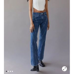 High rise bootcut indigo seams